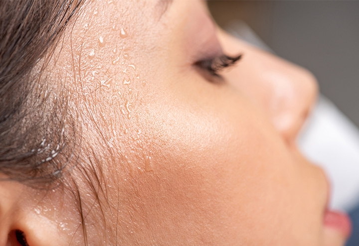 Woman sweating